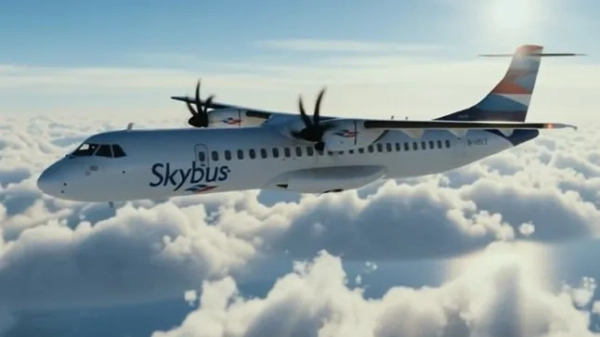 Літак Skybus летить у небі.