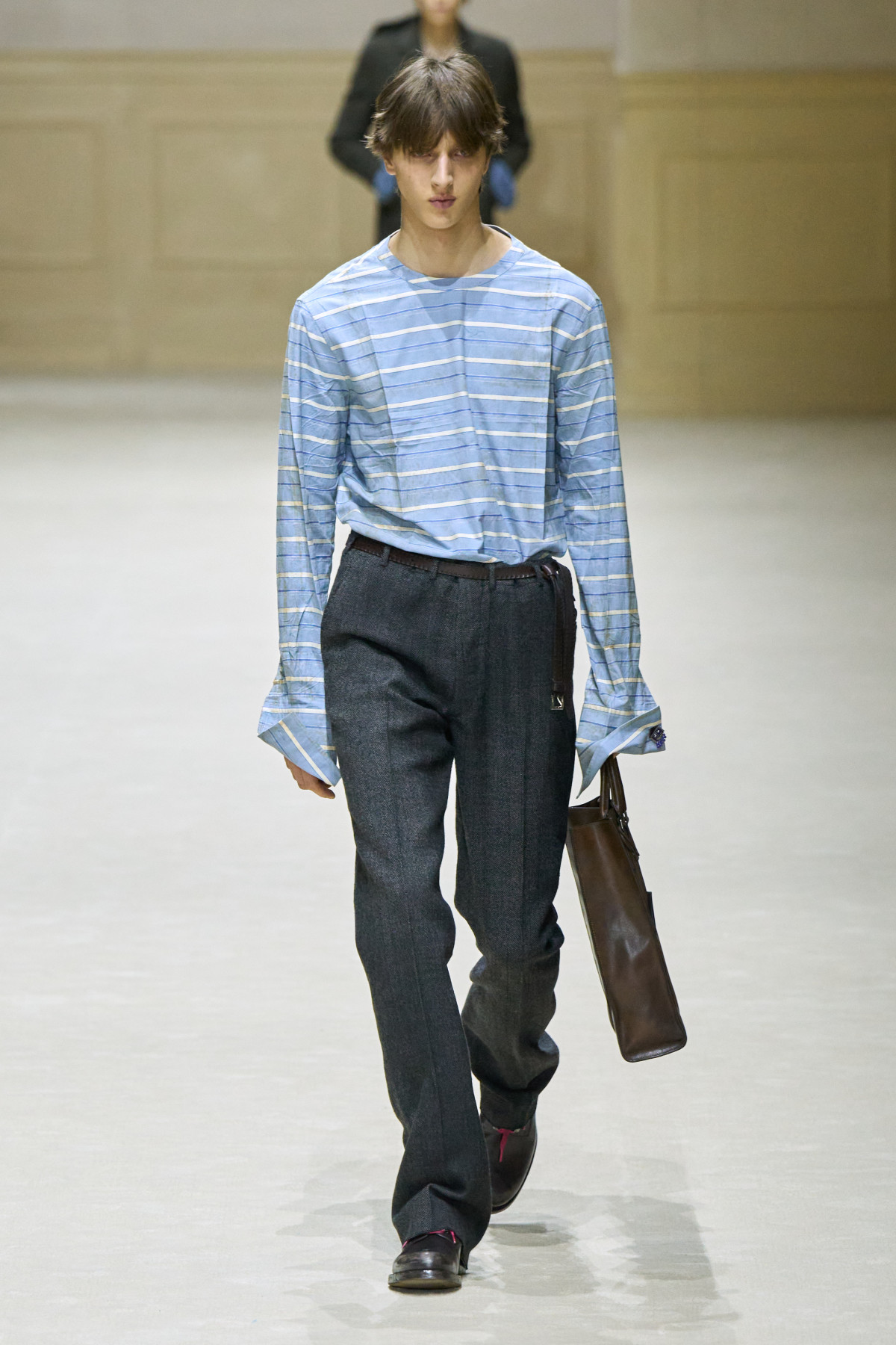 "Раніше та потім": розвиток чоловічого стилю в осінньо-зимовій колекції Prada 2026/27.
4