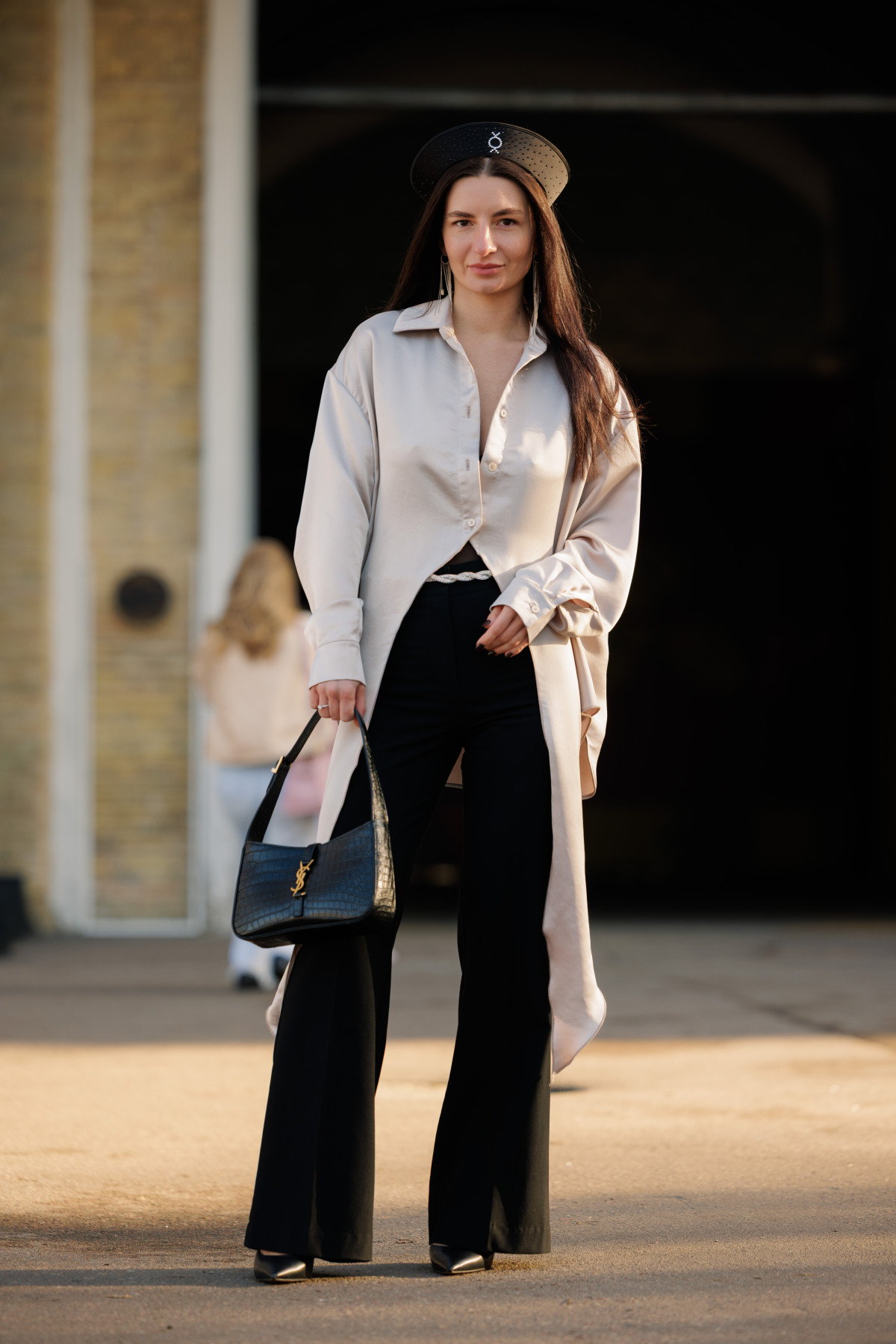 Вулична мода: образи від відвідувачів другого дня Ukrainian Fashion Week, осінь-зима 2026/2027
32