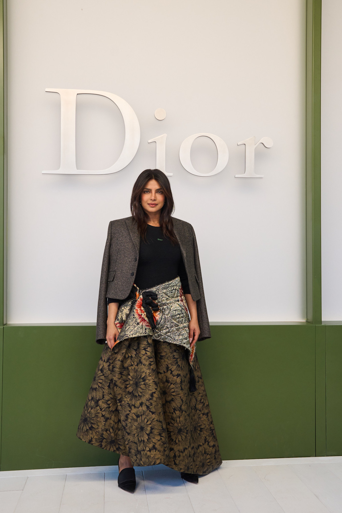 У що вбралися Шарліз Терон, Дева Кассель та інші знаменитості на дефіле Christian Dior
7