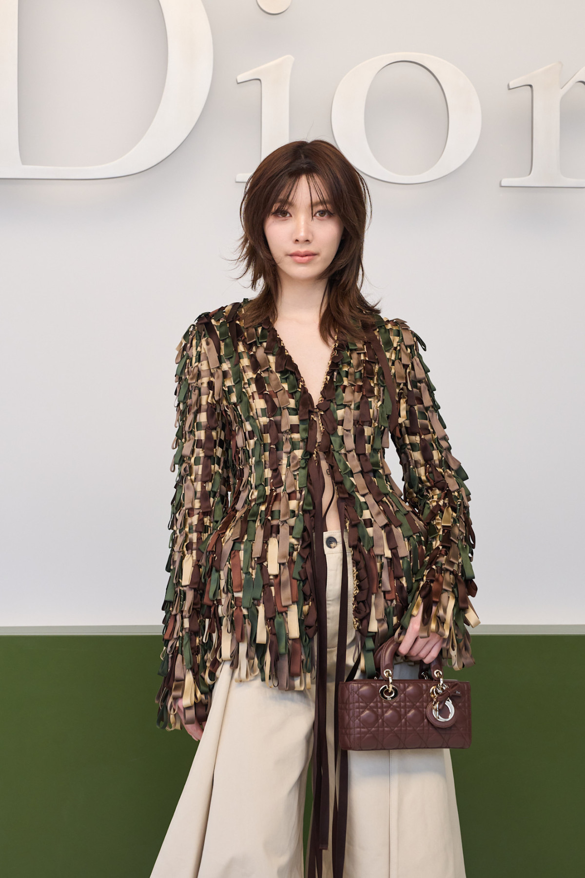 У що вбралися Шарліз Терон, Дева Кассель та інші знаменитості на дефіле Christian Dior
12